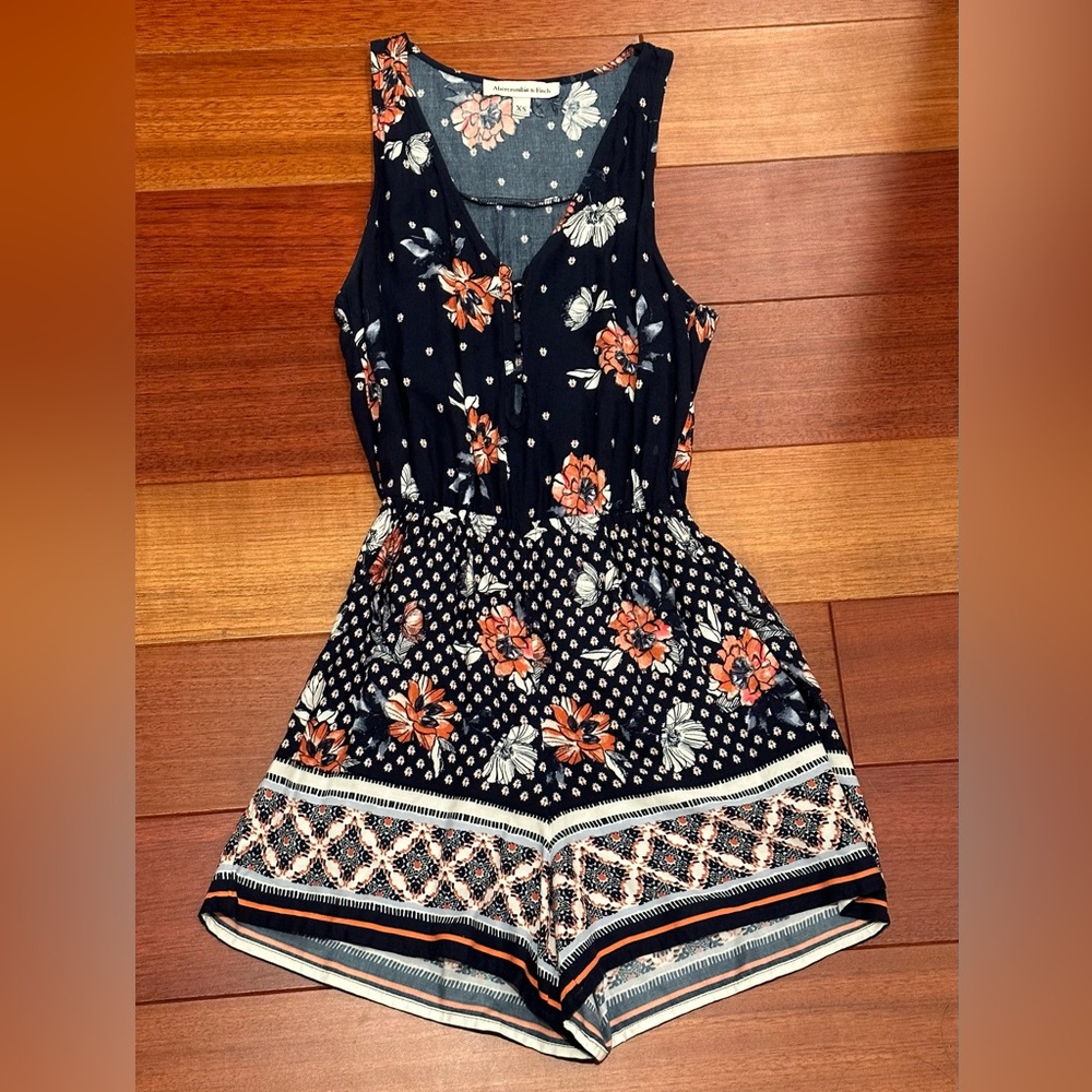 Boho blue floral sleeveless romper from Abercrombie